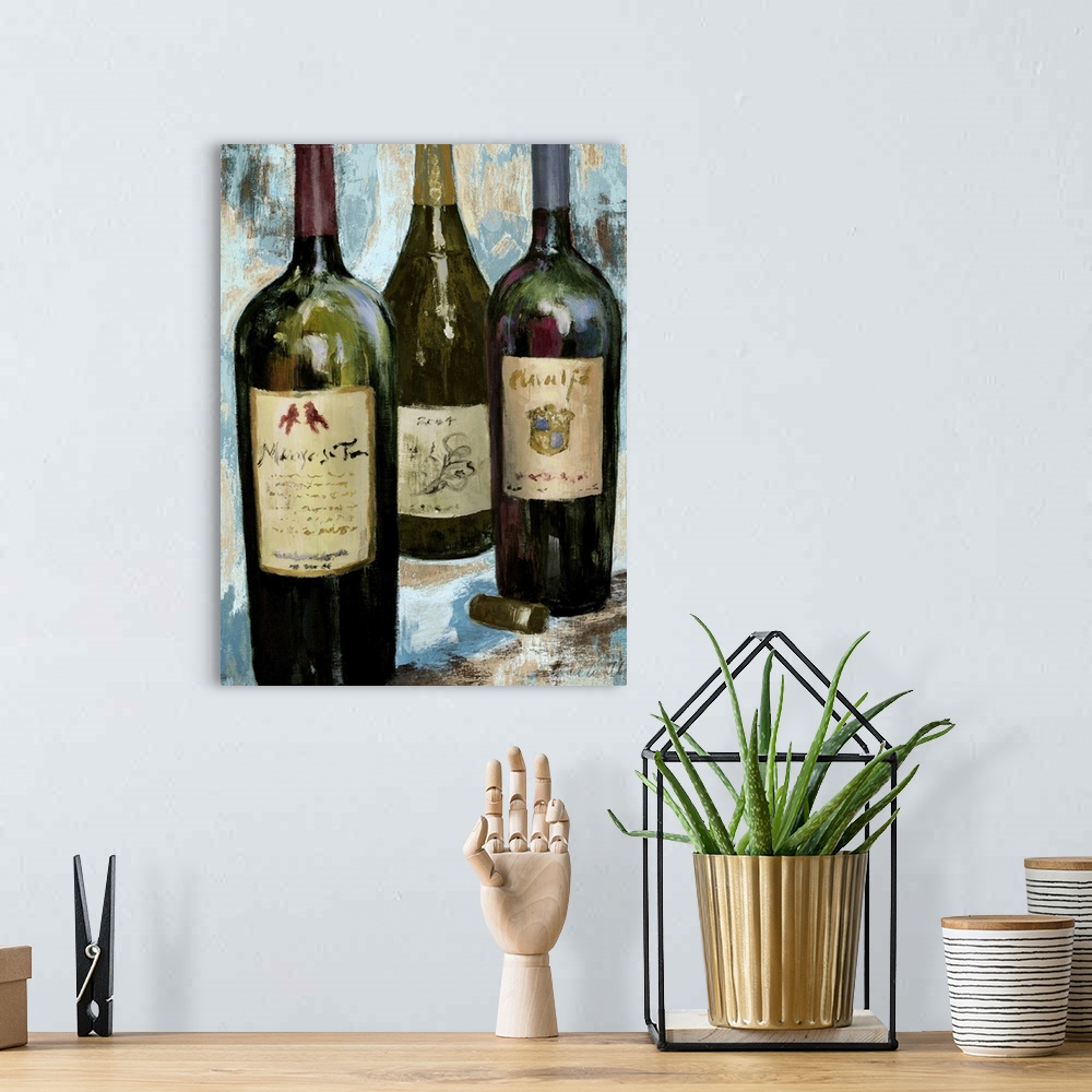 A bohemian room featuring Still life painting of glass red and white wine bottles.