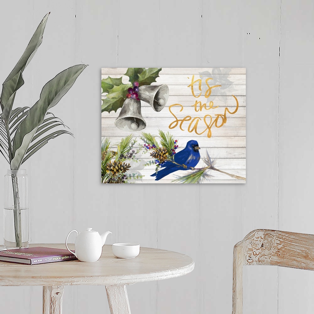 A farmhouse room featuring "Tis the Season" with watercolor bells and a blue bird on a white wood panel background.