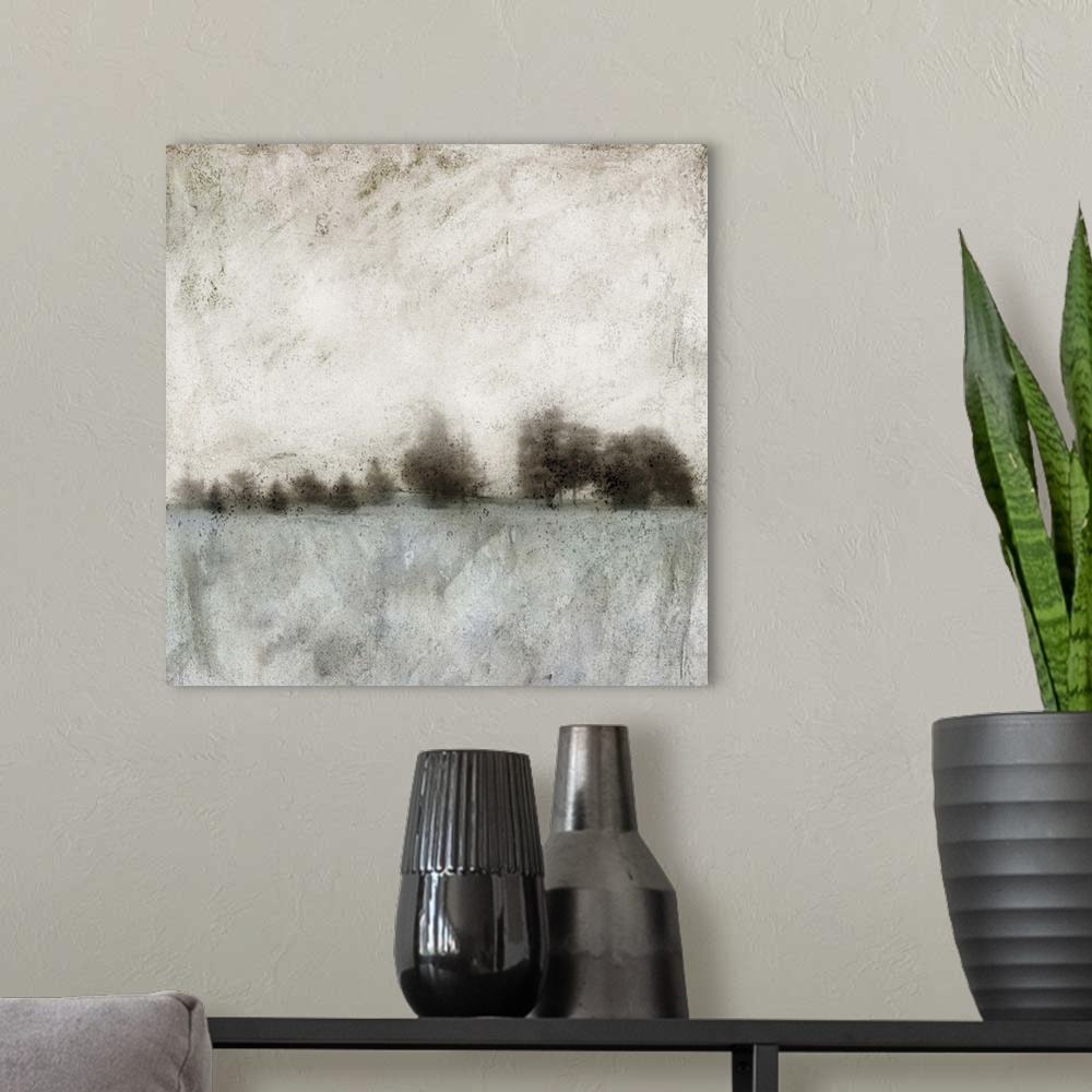 A modern room featuring Square abstract painting of a neutral colored landscape showing an empty field and a tree line.