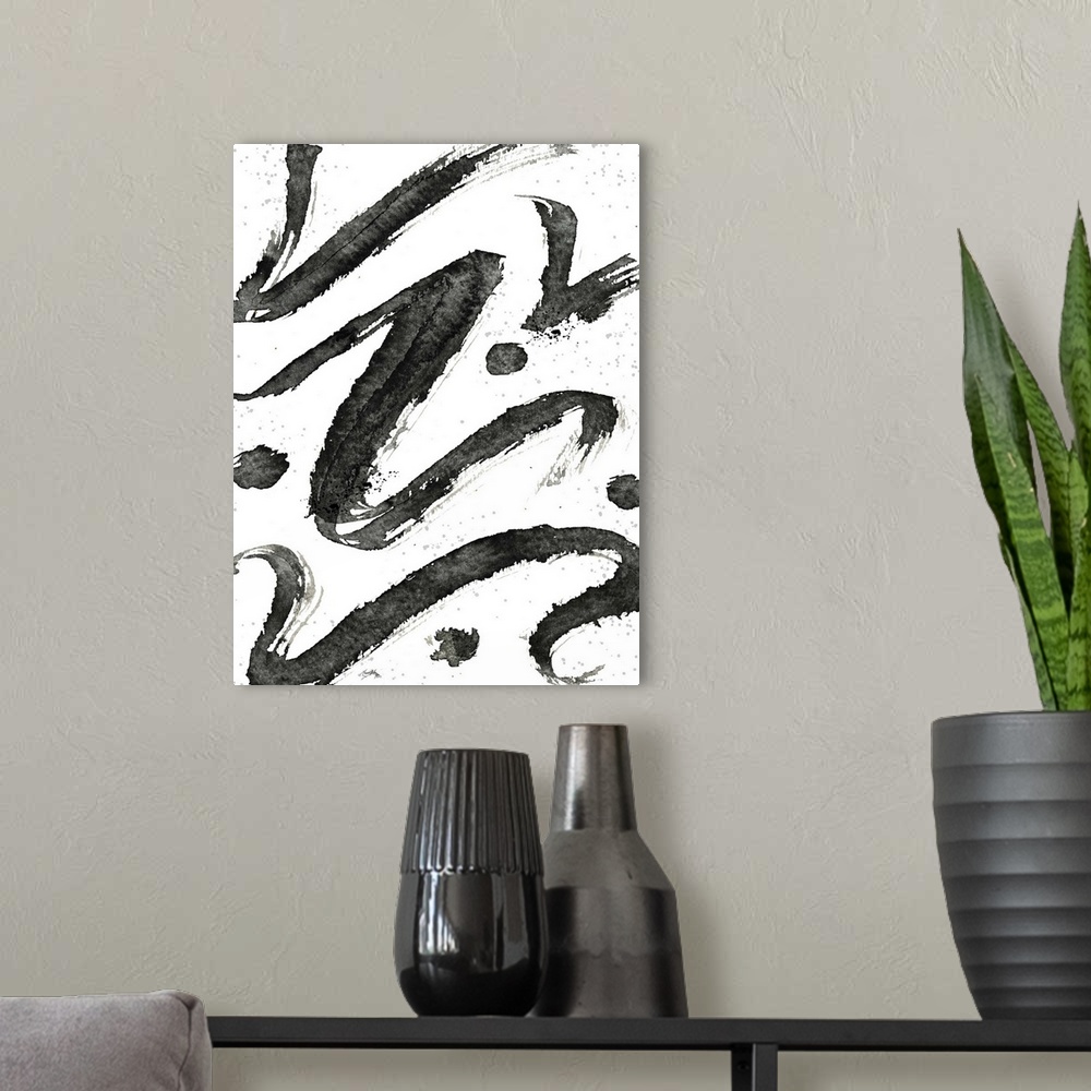 A modern room featuring Black and white abstract painting of tribal swirls with "z" shaped lines.