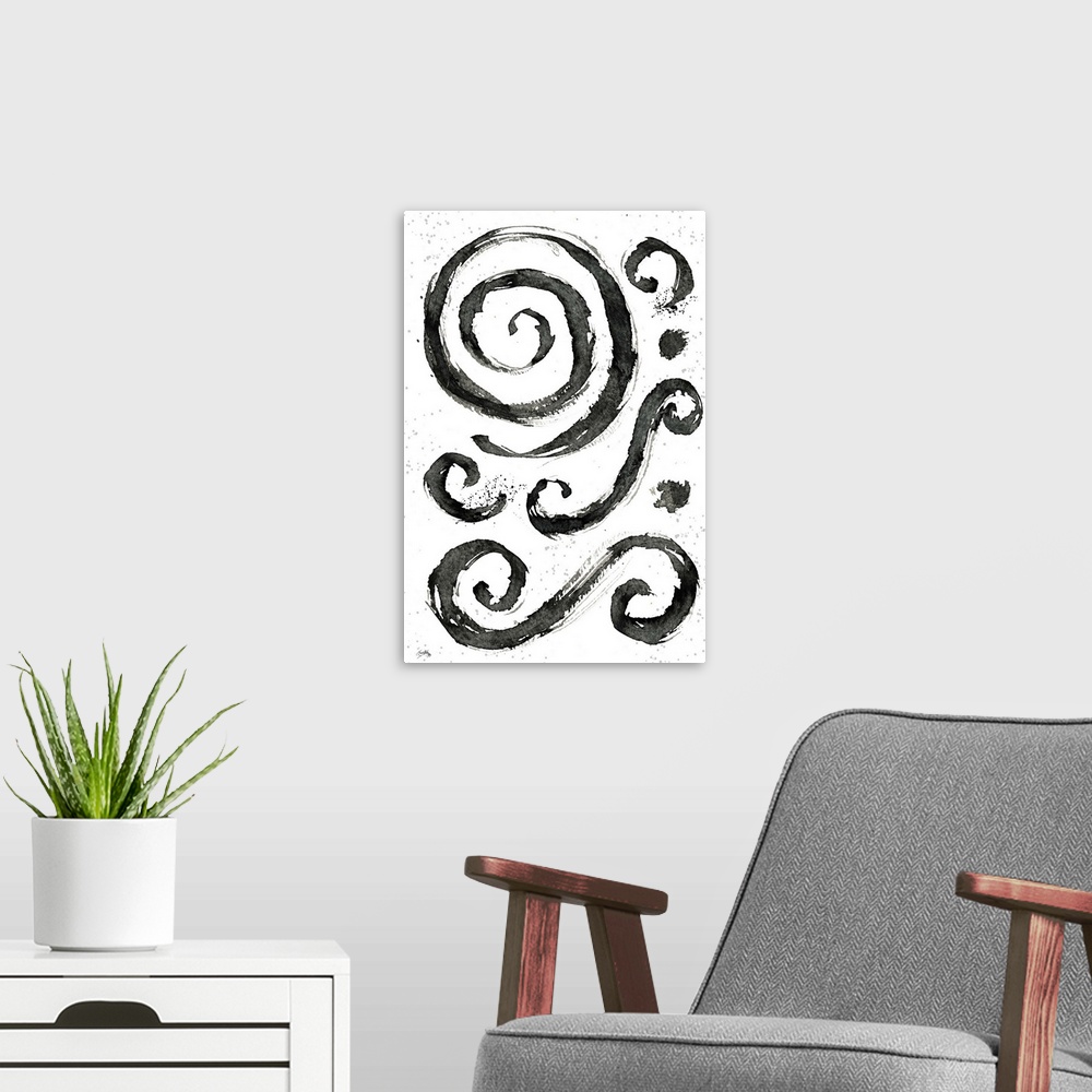 A modern room featuring Black and white abstract painting of tribal swirls.
