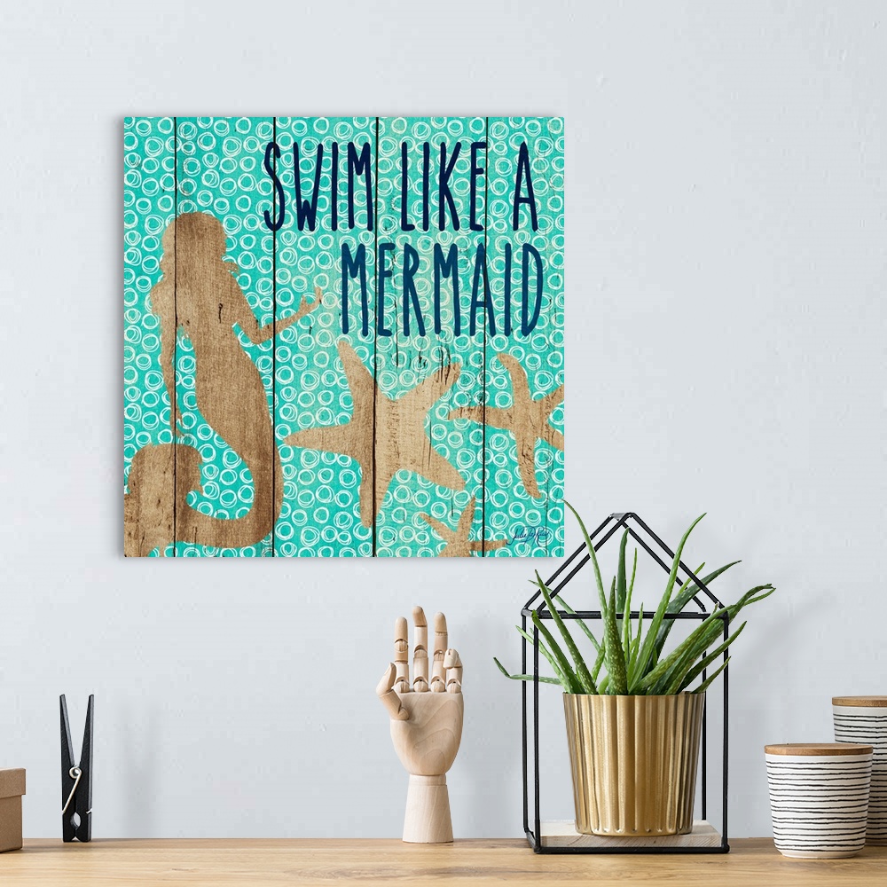 A bohemian room featuring "Swim Like A Mermaid"