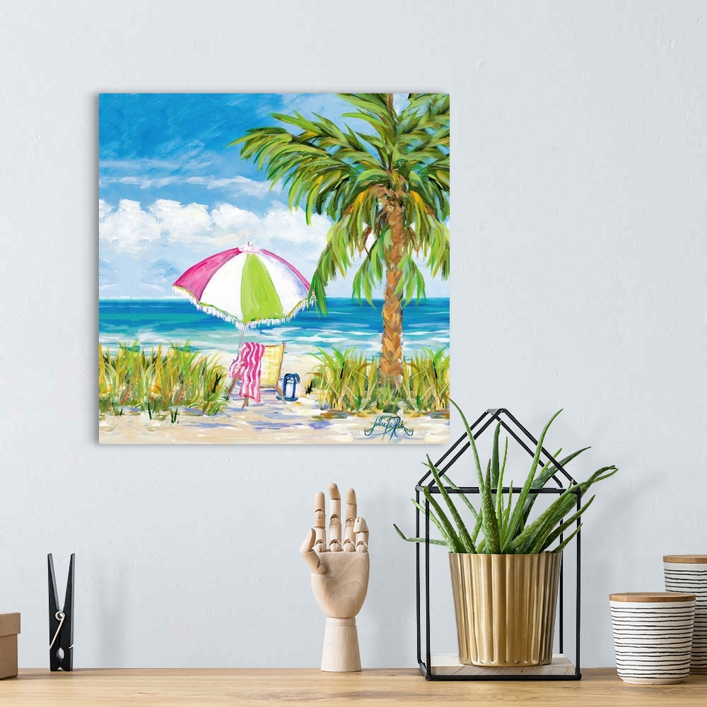 A bohemian room featuring Square painting of a relaxing beach scene with a chair and a colorful umbrella set up next to a p...
