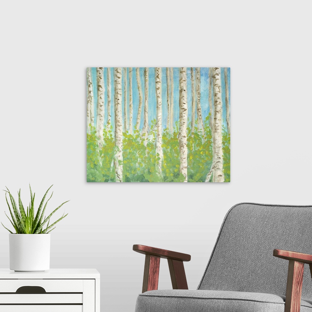 A modern room featuring Decorative artwork of a forest of birch trees.
