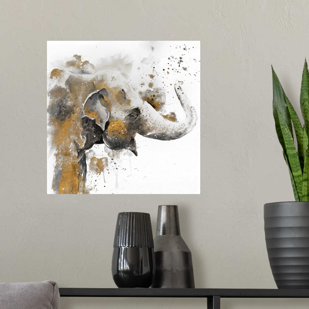 A modern room featuring Watercolor painting of an elephant embellished with gold and paint splatters.