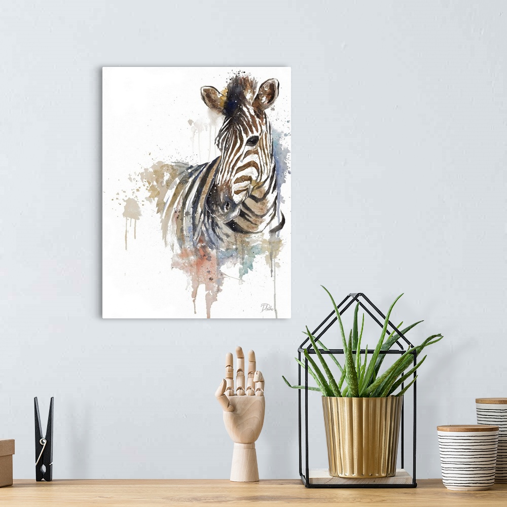 A bohemian room featuring Watercolor painting of a zebra embellished with gold and paint splatters.