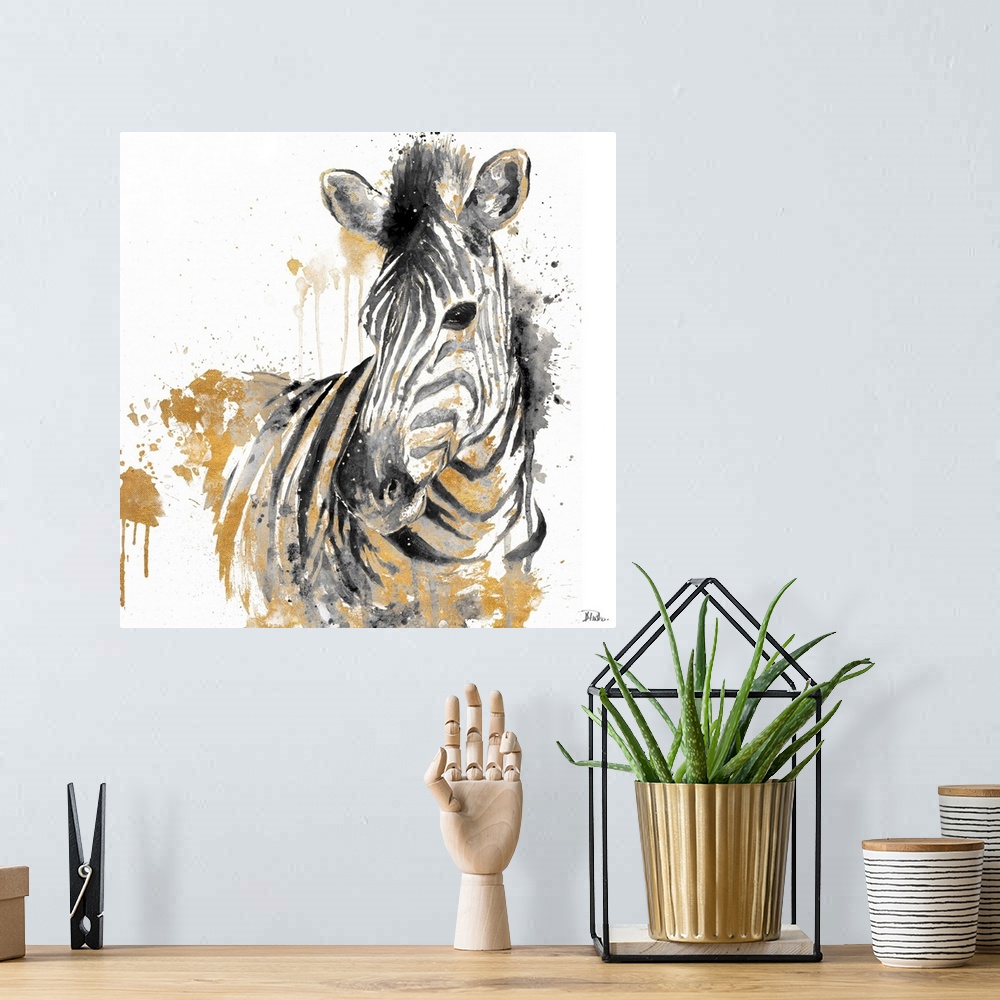 A bohemian room featuring Watercolor painting of a zebra embellished with gold and paint splatters.