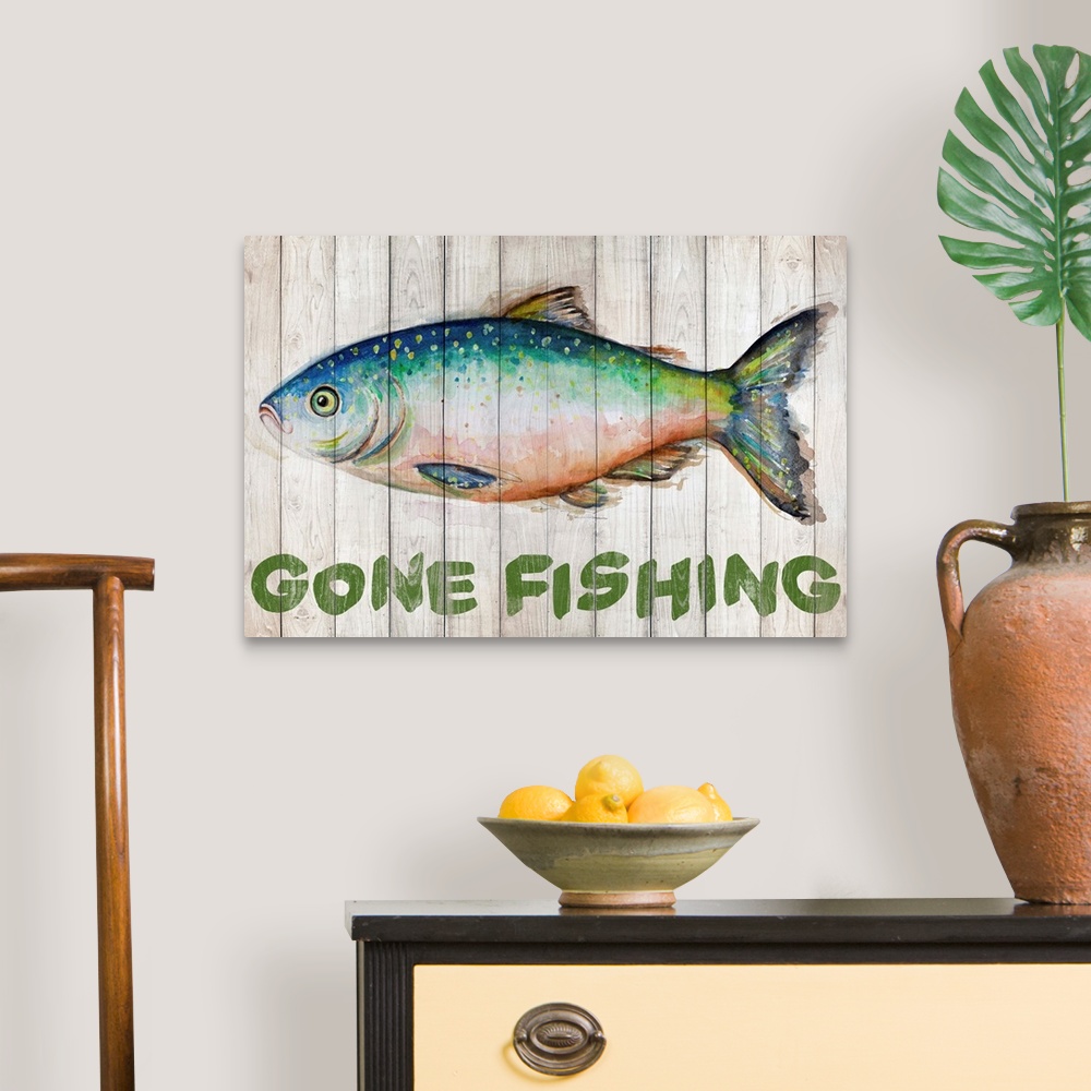 A traditional room featuring Painting of a fish on wooden boards with "Gone Fishing" written underneath.