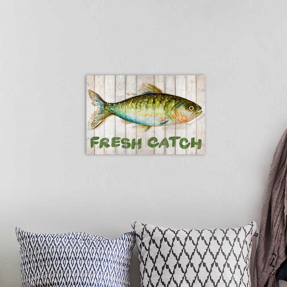 A bohemian room featuring Painting of a fish on wooden boards with "Fresh Catch" written underneath.