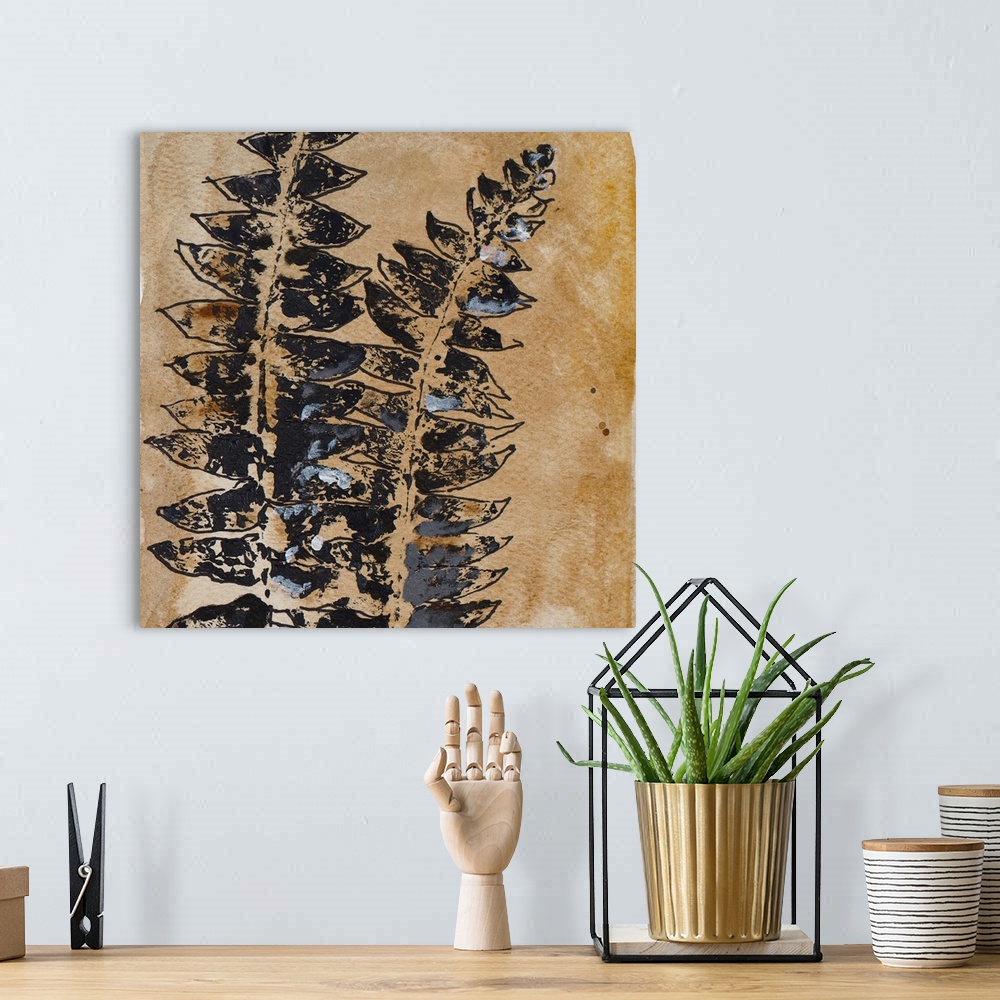 A bohemian room featuring A textured watercolor painting of leaves.