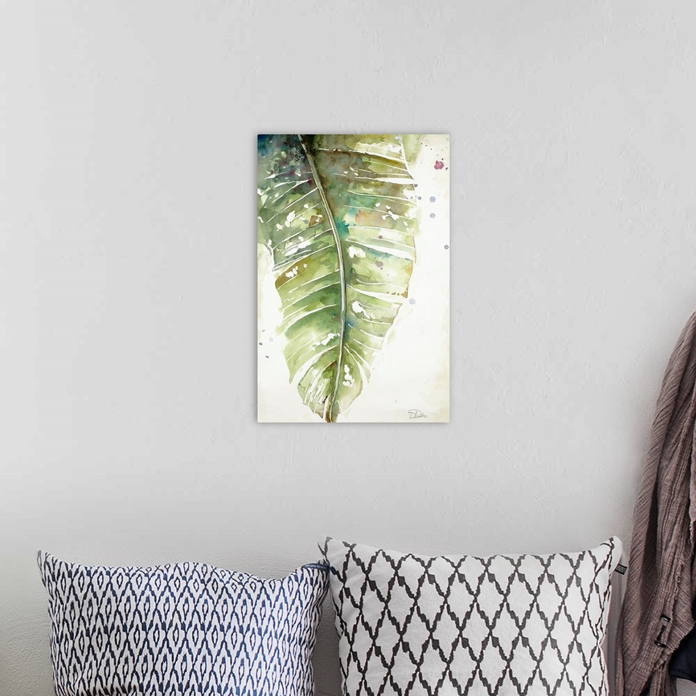 A bohemian room featuring A watercolor painting of a green toned plantain leaf.