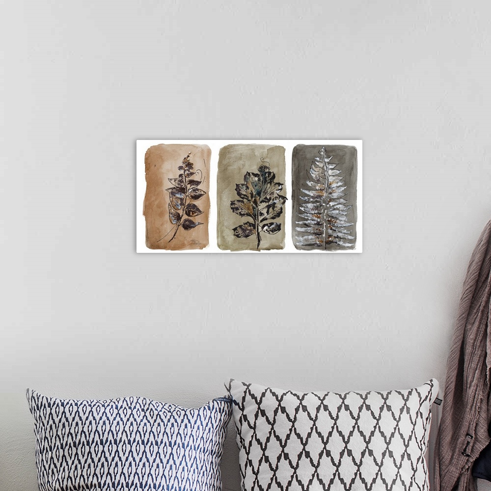 A bohemian room featuring A contemporary watercolor painting split into three separate sections with a different leaf on ea...