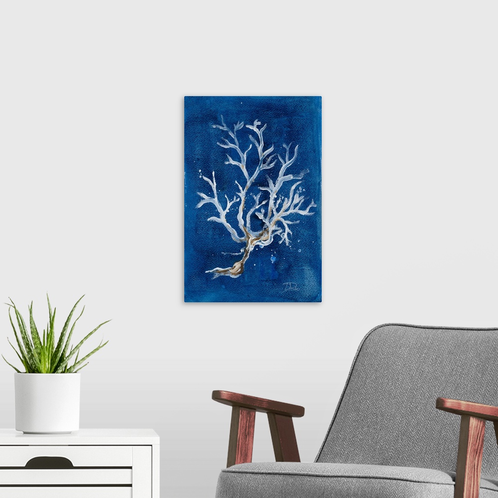 A modern room featuring A contemporary painting of white corals on a deep blue background.