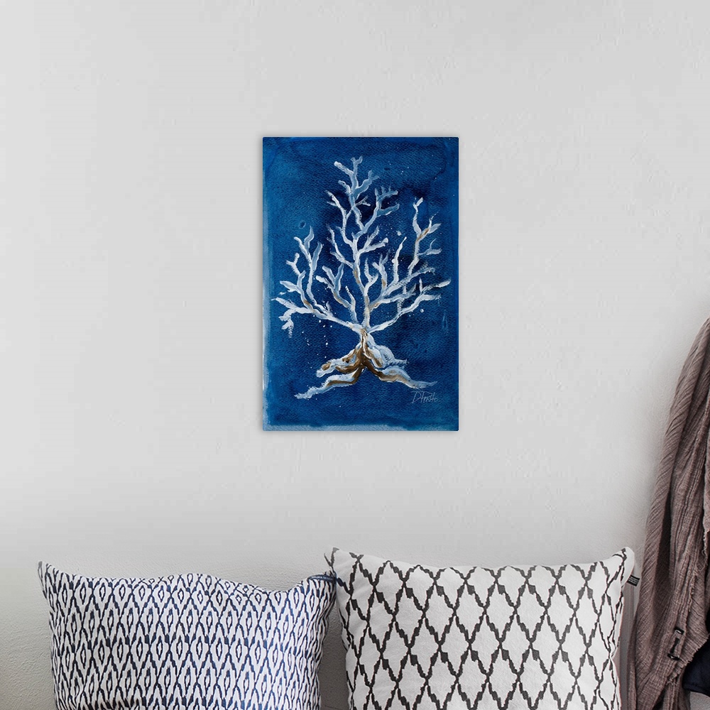 A bohemian room featuring A contemporary painting of white corals on a deep blue background.