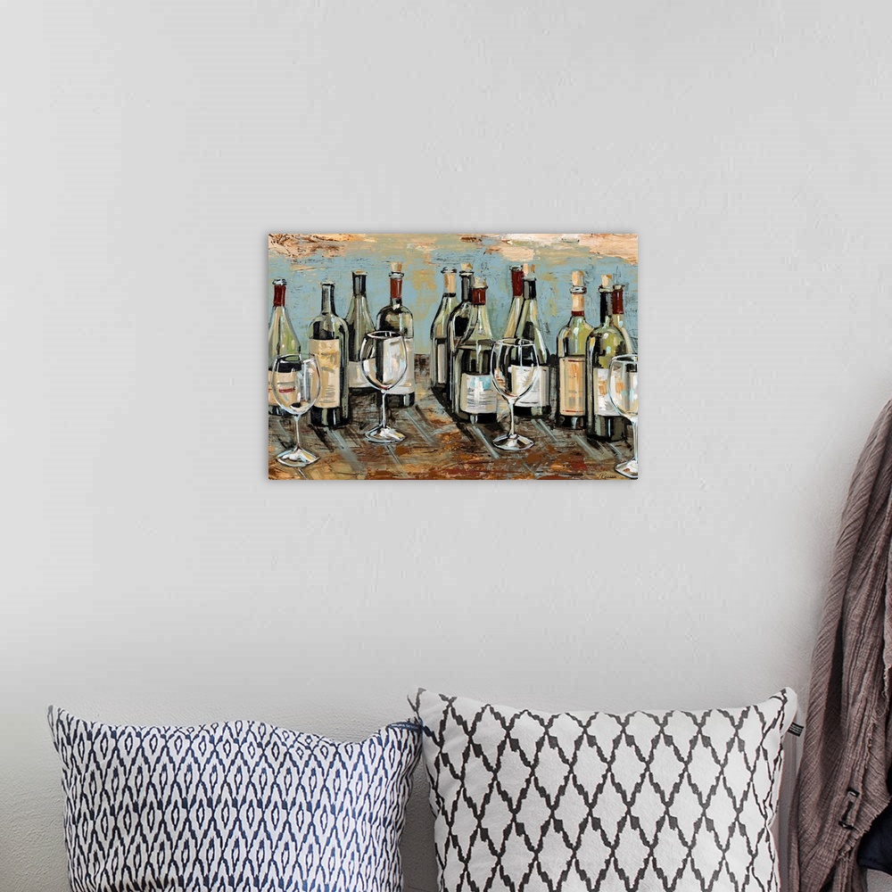 A bohemian room featuring Horizontal painting on a giant canvas of many open bottles of wine, sitting on a counter with sev...
