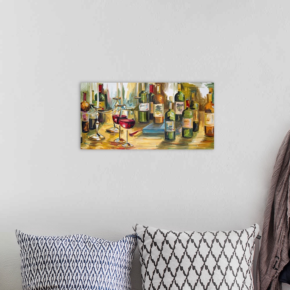 A bohemian room featuring Panoramic photograph of bottles of champagne and wine scattered across a table with two wine glas...