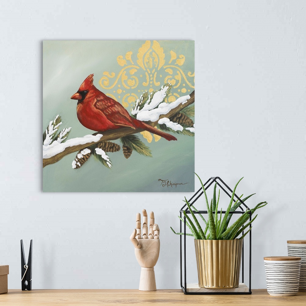 A bohemian room featuring Decorative artwork of a cardinal perched on a snowy branch with a gold damask in the background.