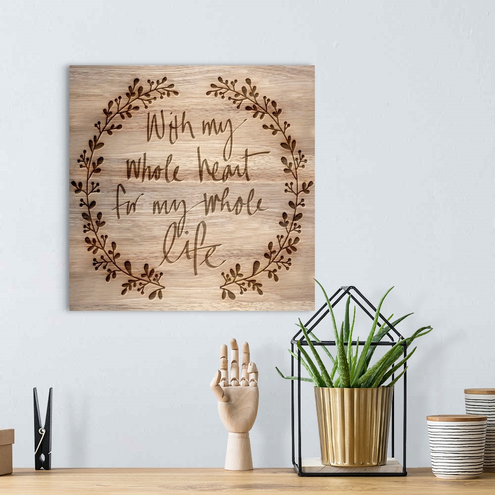 A bohemian room featuring "With my whole heart for my whole life" on a wood grain background.