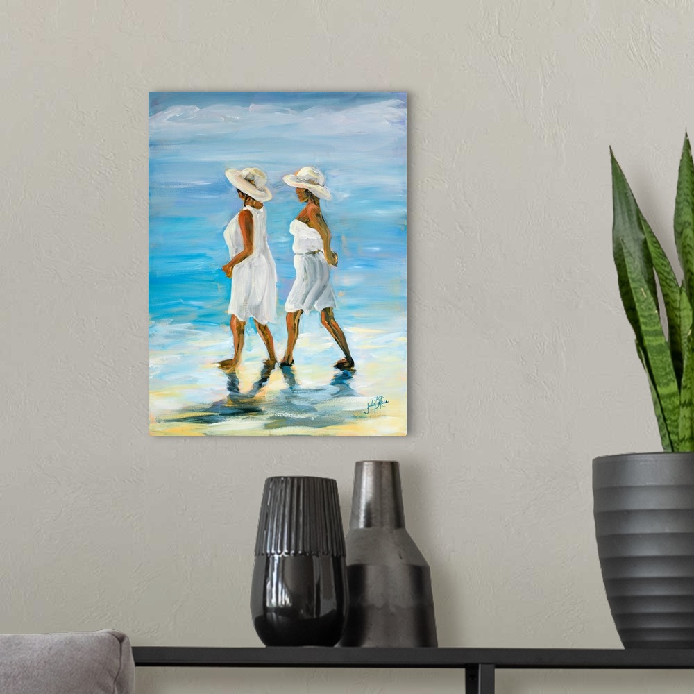 A modern room featuring Painting of two women in white walking along the water's edge.
