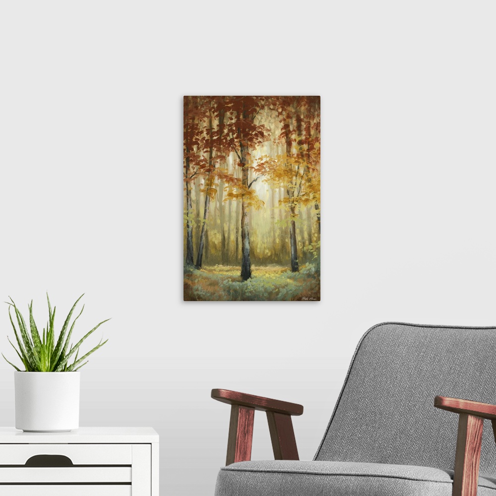 A modern room featuring Contemporary painting of an autumn foliage forest illuminated in a soft glow.