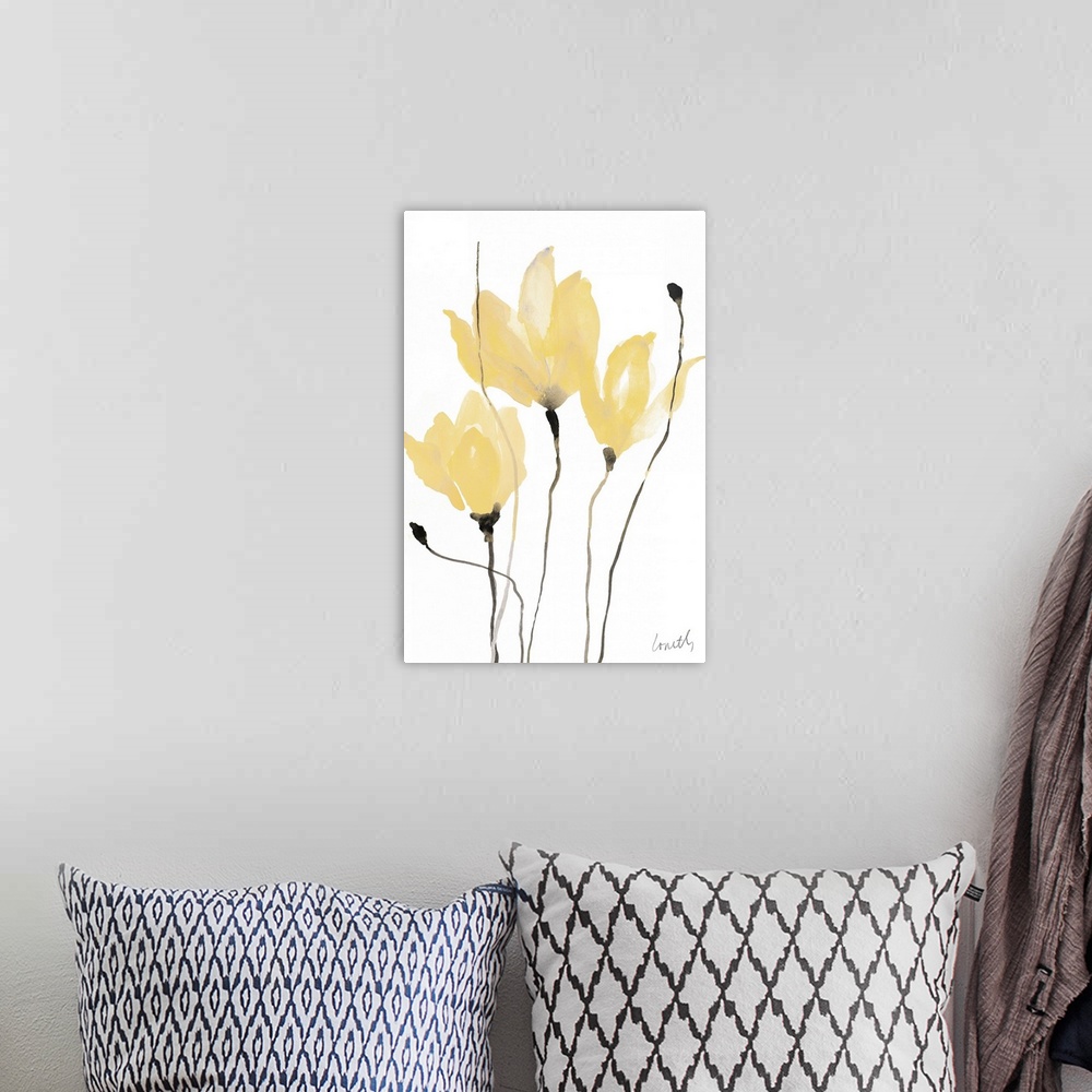 A bohemian room featuring A watercolor painting of three yellow flowers with thin stems.