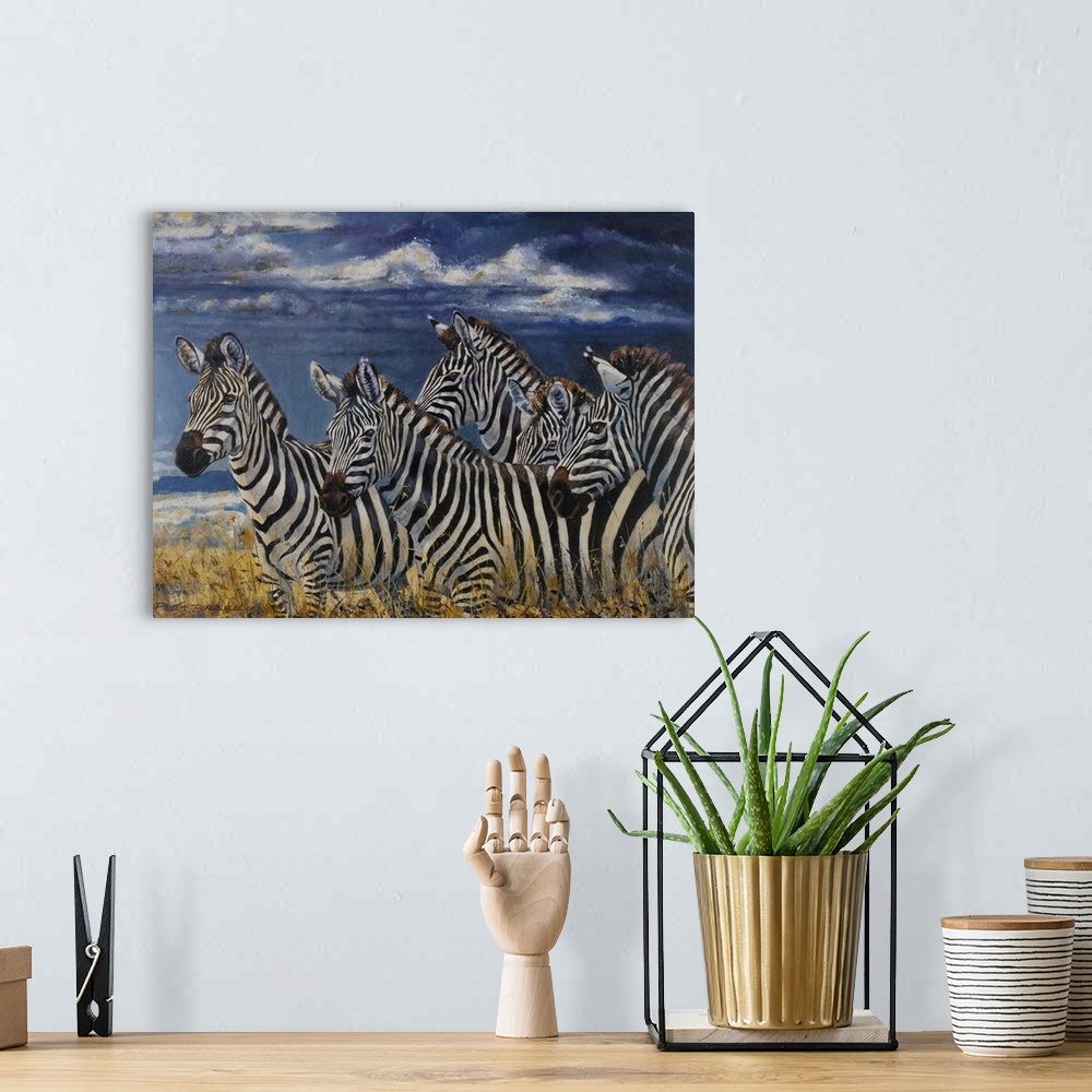 A bohemian room featuring Contemporary wildlife painting of a group of zebras on the Serengeti.
