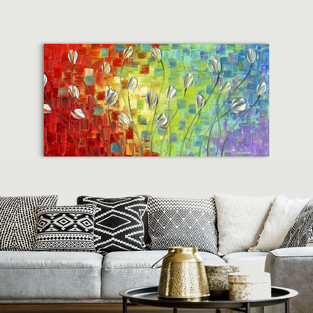 A bohemian room featuring Large abstract painting with silver long stemmed tulips on a colorful background.