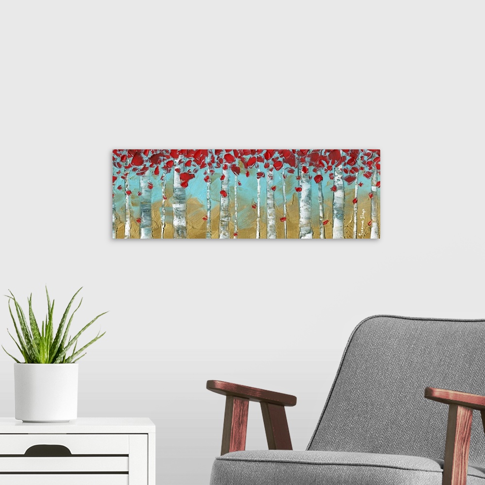 A modern room featuring Panoramic painting of Birch trees on a gold and light blue background with bright red leaves.