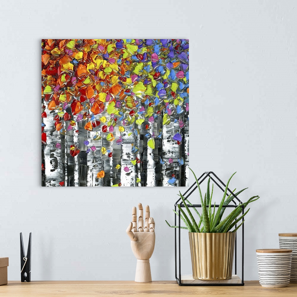 A bohemian room featuring Abstract painting of Birch trees with colorful leaves on a square background.