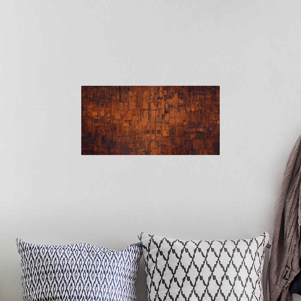 A bohemian room featuring Large brown and burnt orange abstract painting.