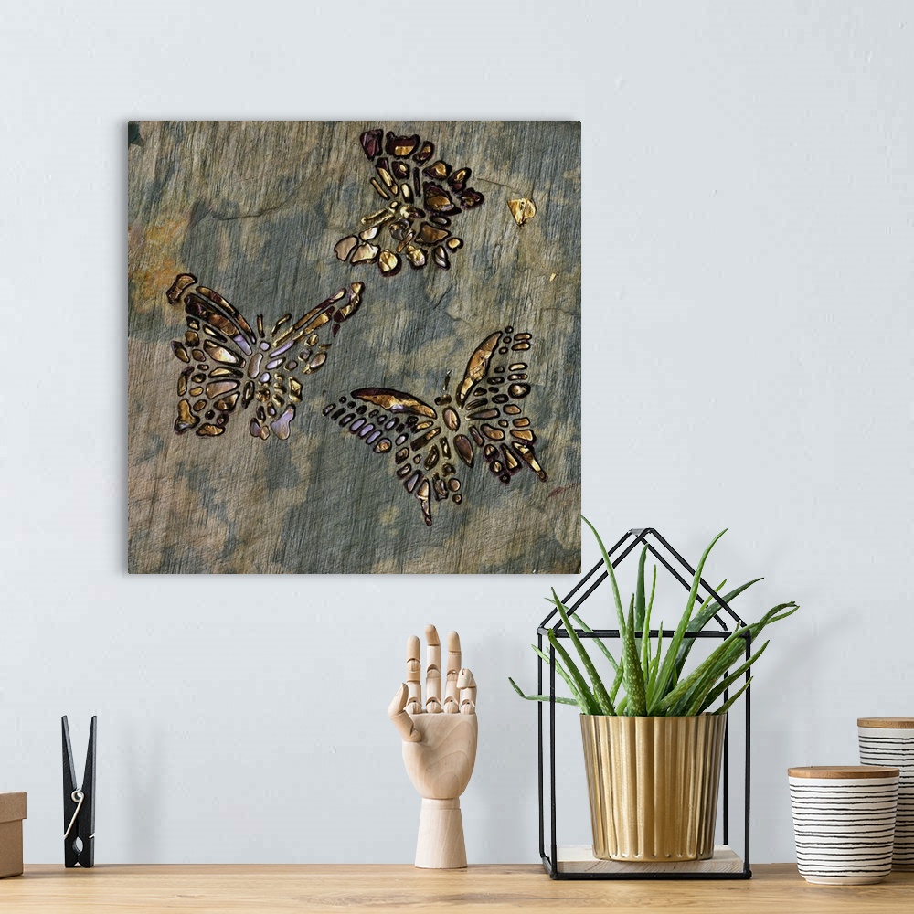 A bohemian room featuring Square painting with three butterflies made out of non connecting shapes, in gold and lavender sh...