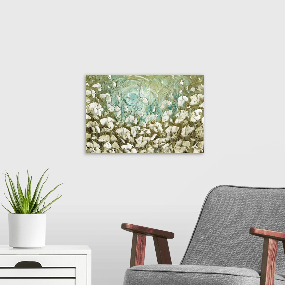 A modern room featuring Large abstract painting with white flowers on a green and blue background.