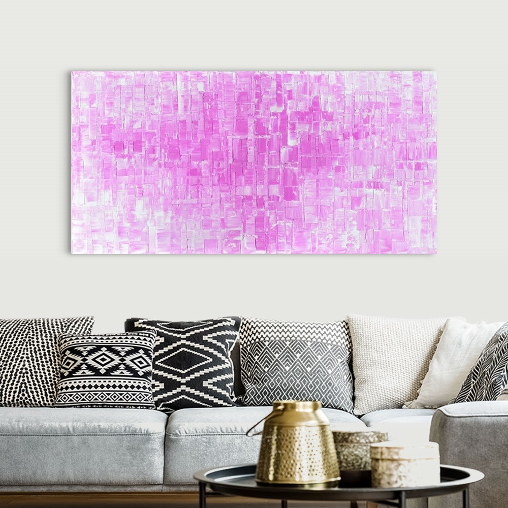 A bohemian room featuring Large abstract art in shades of pink and white with geometric shapes.