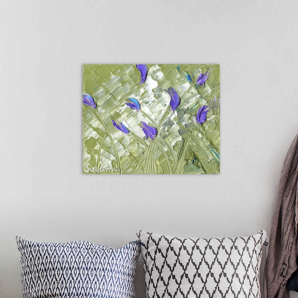 A bohemian room featuring Large abstract painting with purple tulips on sage green background.