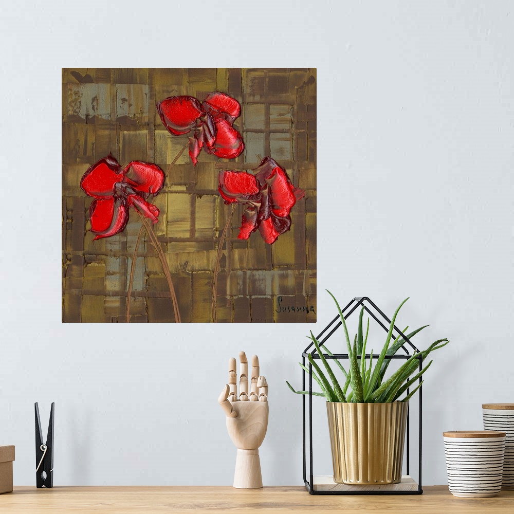 A bohemian room featuring Contemporary painting of three bright red poppies on a brown, gray, and gold textured background ...