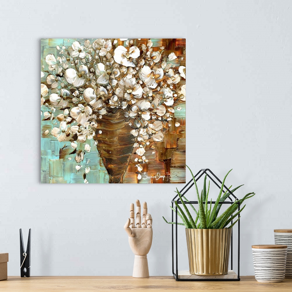 A bohemian room featuring Abstract contemporary white floral bouquet in vase.