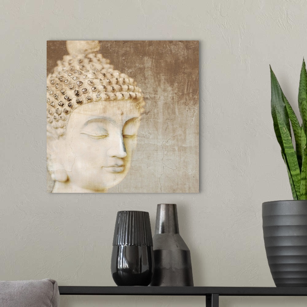 A modern room featuring Contemporary photograph of the head of a Buddha statue.