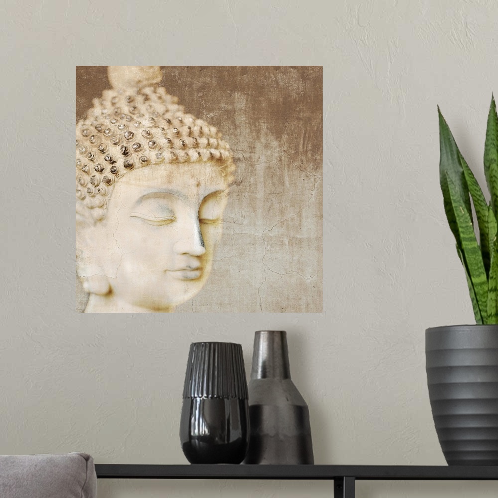 A modern room featuring Contemporary photograph of the head of a Buddha statue.