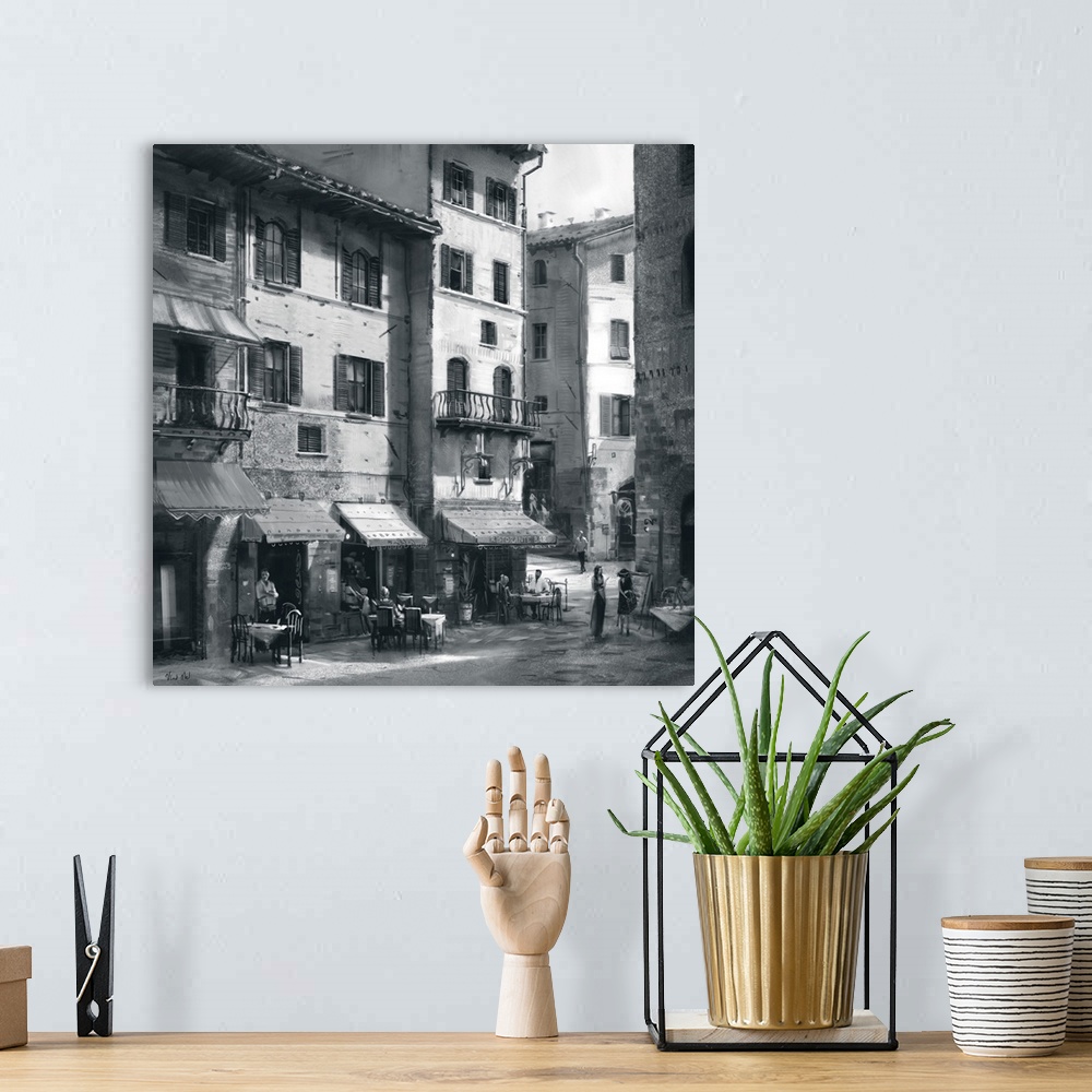 A bohemian room featuring Monochrome painting of a rustic Tuscan town street.