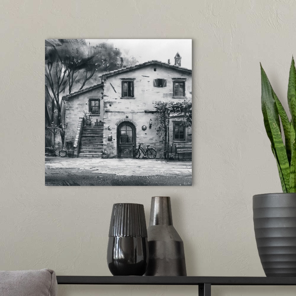 A modern room featuring Monochrome painting of a rustic Tuscan villa structure.