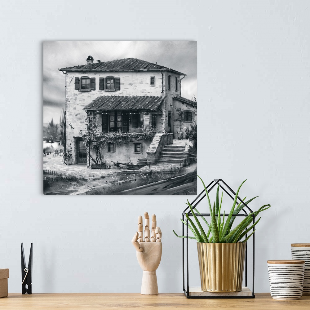 A bohemian room featuring Monochrome painting of a rustic Tuscan farmhouse.