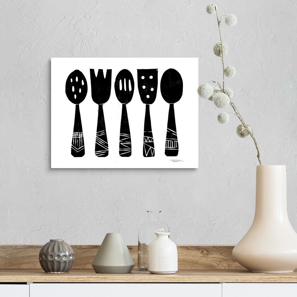 A farmhouse room featuring Block printed kitchen utensils in black.