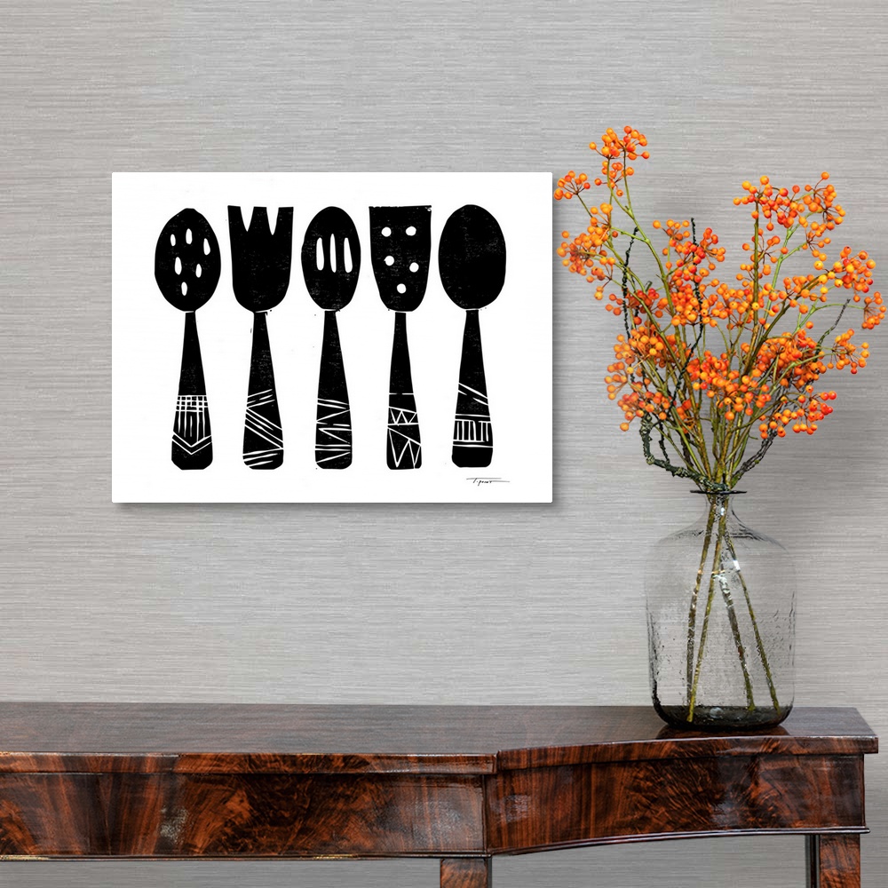A traditional room featuring Block printed kitchen utensils in black.