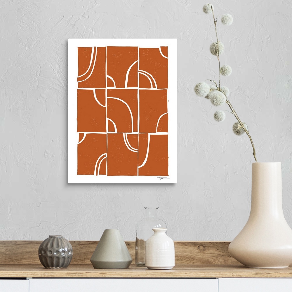 A farmhouse room featuring Modern block print shapes with arches in the color burnt orange.
