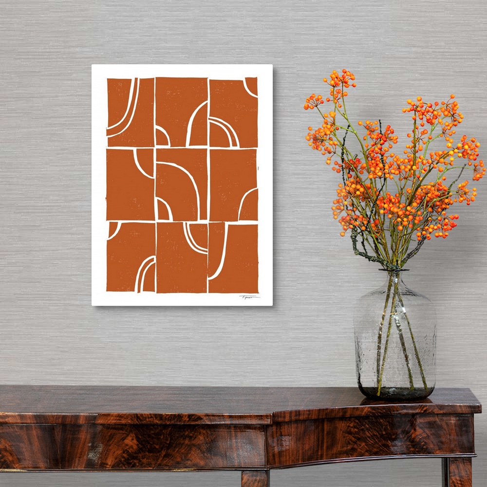 A traditional room featuring Modern block print shapes with arches in the color burnt orange.