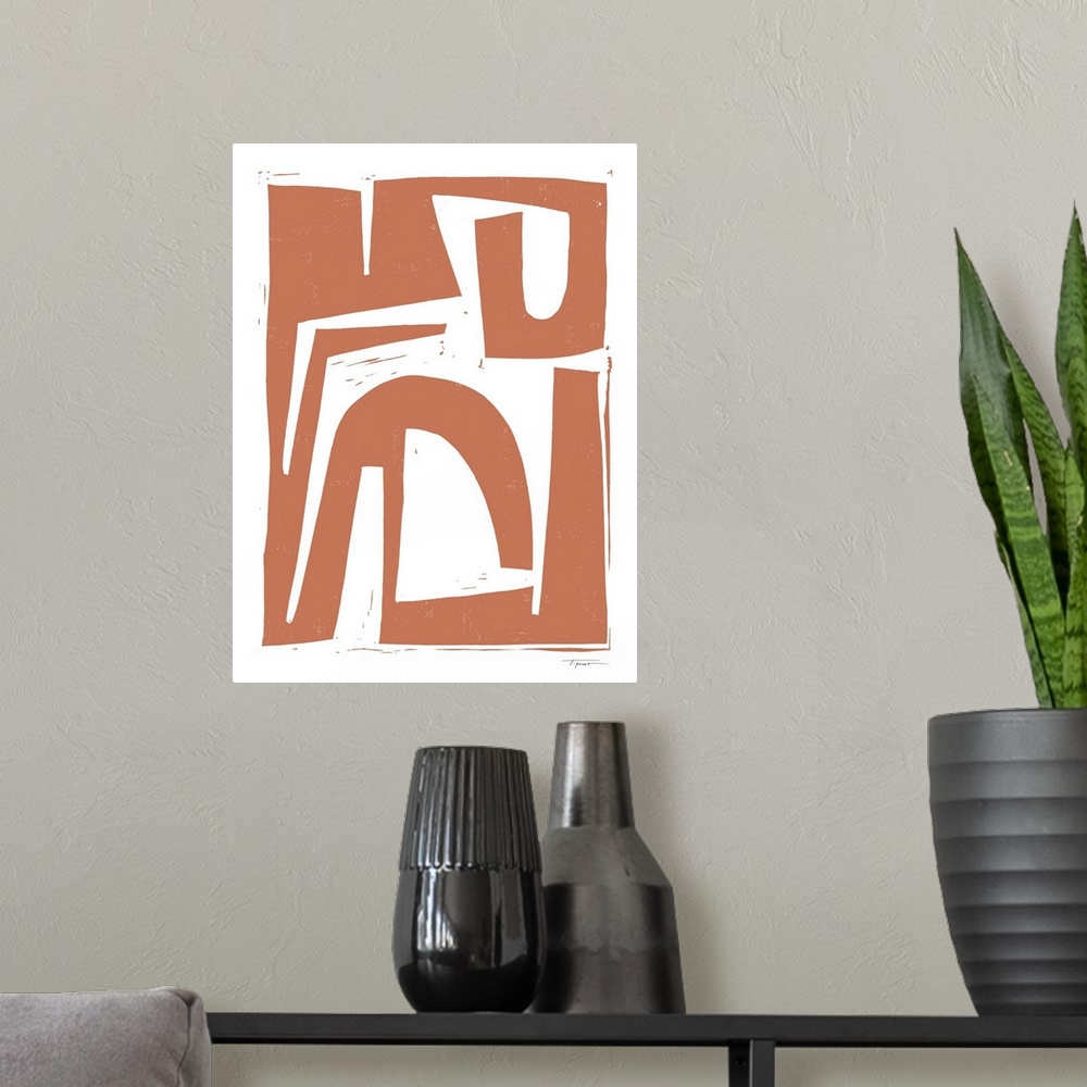 A modern room featuring Abstract tribal block print in the color terra cotta.