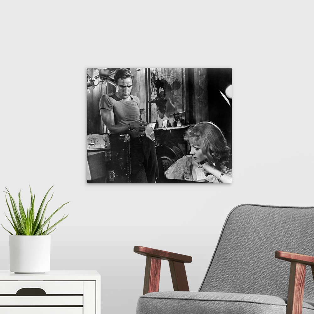 A modern room featuring Marlon Brando as Stanley Kowalski and Vivien Leigh as his sister-in-law Blanche DuBois in the fil...