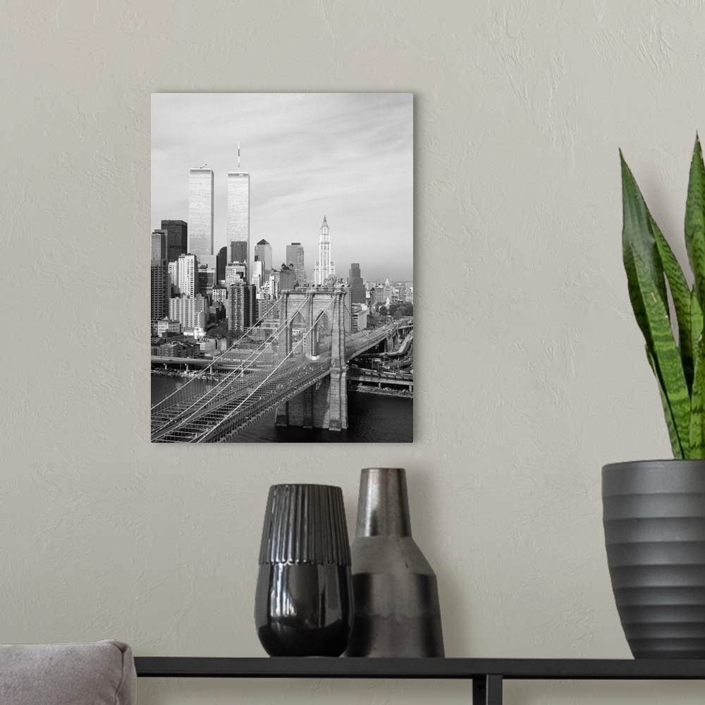A modern room featuring A view of the Brooklyn Bridge looking west towards Manhattan, New York. Photograph by Jet Lowe, 1...