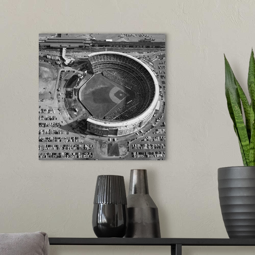 A modern room featuring Aerial view of Shea Stadium in Queens, New York. Photograph, c1970.