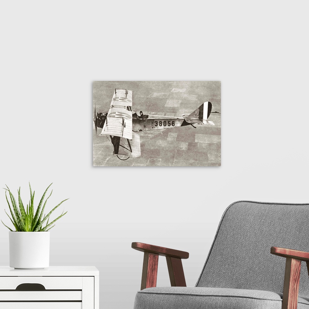 A modern room featuring American aviator flying a biplane bomber over Ellington Field, Texas. Photograph, c1917.